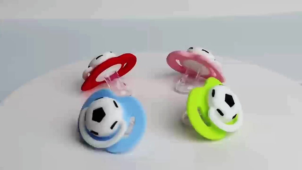 Easy Clean Soccer Ball Style Soother Silicone Soccer Ball Style Soother for and 0-6 Years - One-Piece Design, Easy to Clean, Soft on Gums, Available in Red, Blue, Green, Pink